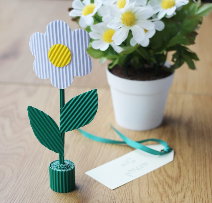 Simple flower made of coloured corrugated cardboard